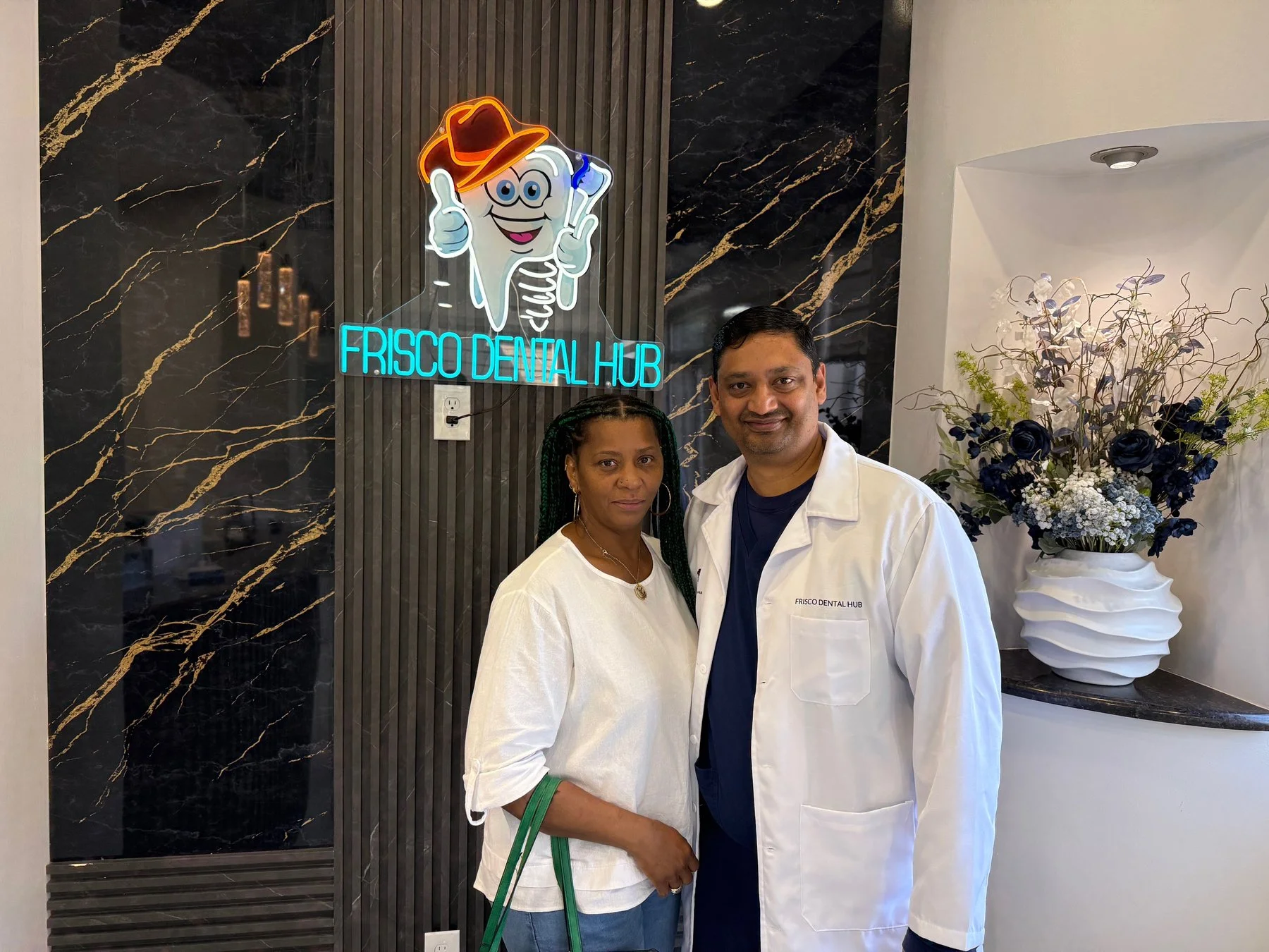 Dr. Chakrapani Nannapaneni DDS performing holistic, patient-centered dental treatment at Merry Dental Hub — mercury-free, BPA-free care in Wylie TX