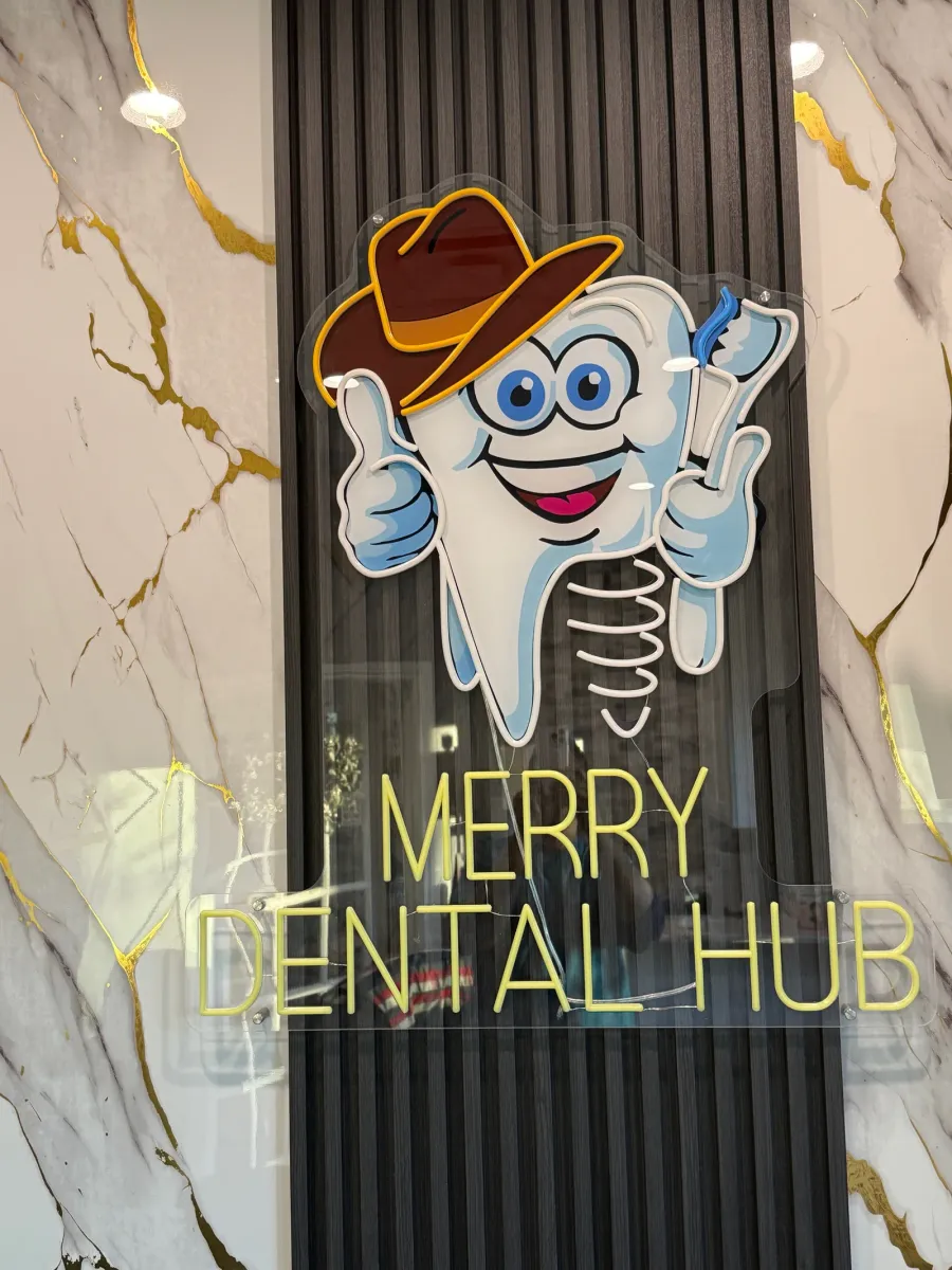 Dr. Chakrapani Nannapaneni DDS treating a patient at Merry Dental Hub — same-day emergency dental appointment in Wylie TX 75098, 2260 Country Club Rd Suite 101, (972) 483-4848